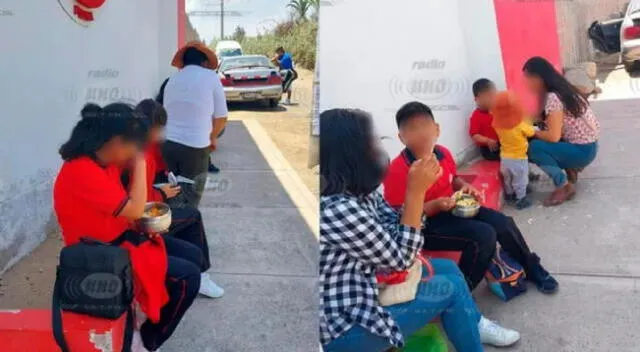 Alumnos comiendo en el piso en exteriores de colegio.