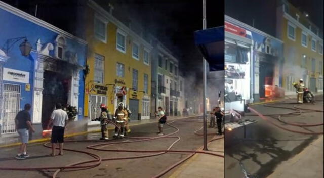 Bomberos controlando incendio en casona de Trujillo.