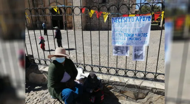 Esposa de hombre atropellado pidiendo ayuda.