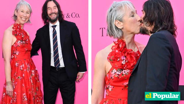 Keanu Reeves y su pareja Alexandra Grant besándose en alfombra roja.    