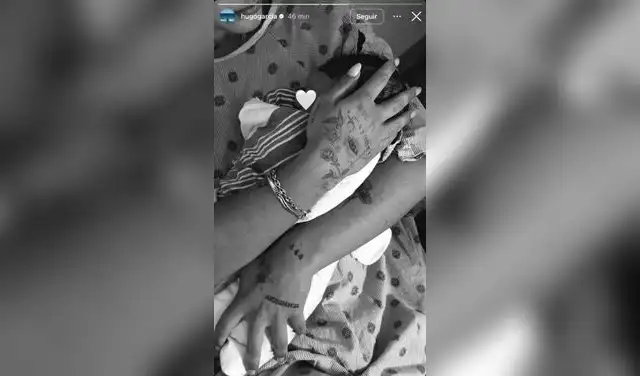 Hugo García postea fotografía de Isabella Ladera cargando al bebé.
