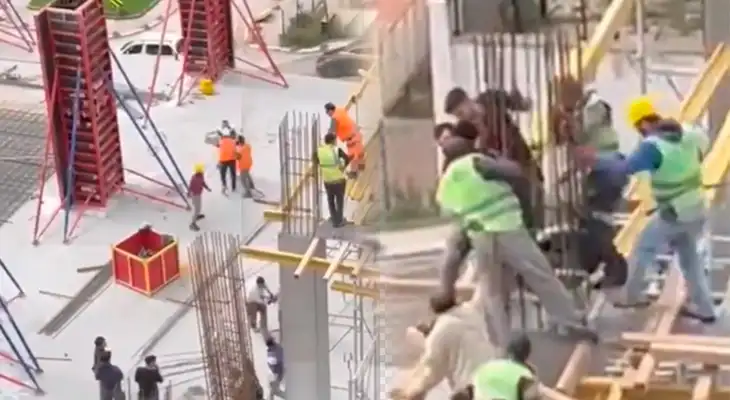 Albañiles protagonizan la pelea del año en lo alto de un edificio.