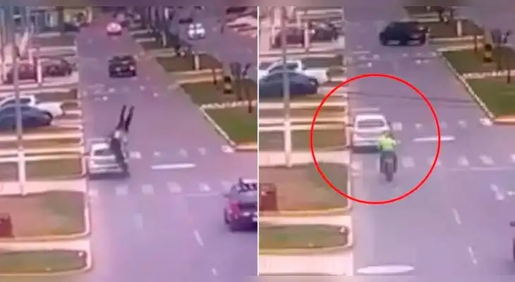 El policía salió volando tras chocar violentamente contra un carro. El policía salió volando tras chocar violentamente contra un carro.